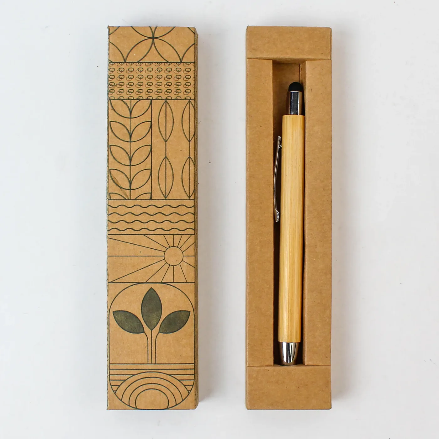 The printed kraft sleeve beside its tray, with the bamboo stylus pen sitting in the tray