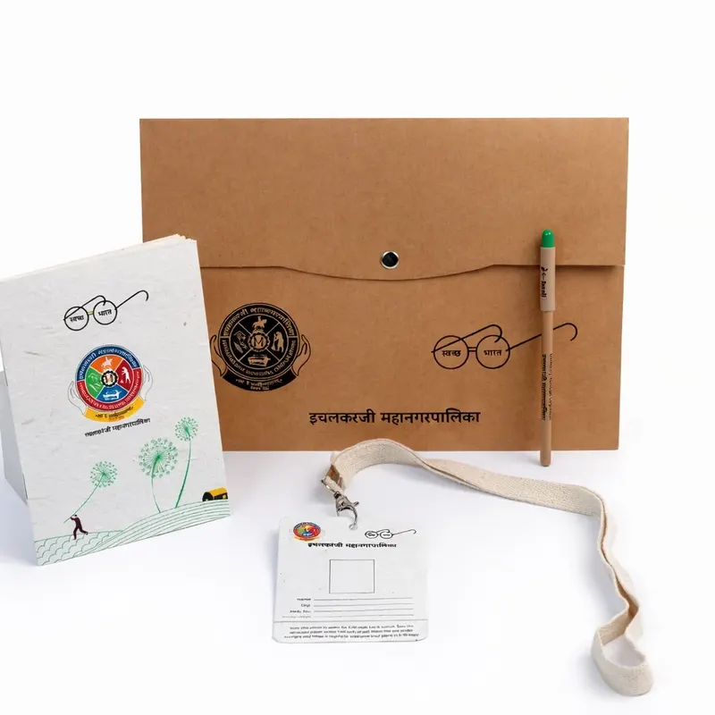 Event handover kit with kraft pouch, lanyard and plantable stationery