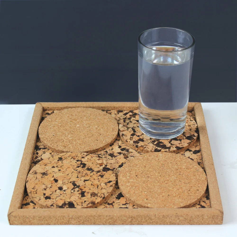 CK51-04 square tray with four round cork coasters in use beside a drinking glass