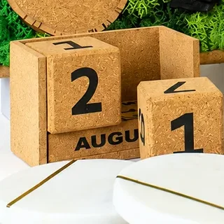The cork block calendar with two date cubes and a month block