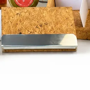 The cork-covered metal visiting card holder