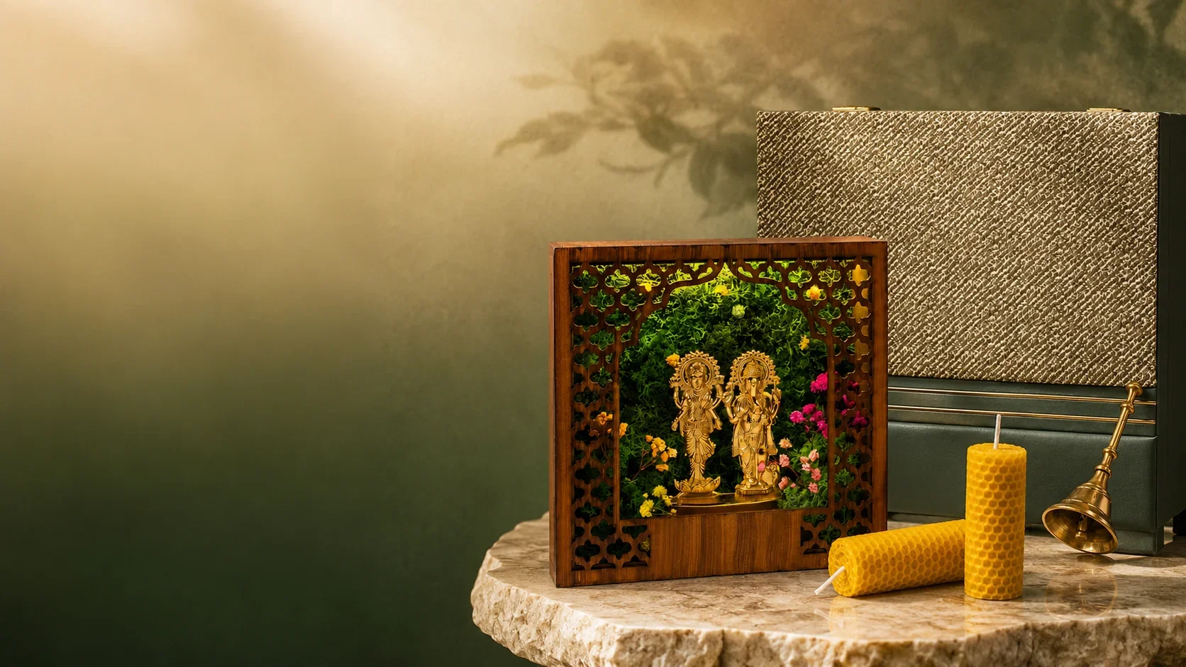 The Namah Chest set on a stone ledge: the lit Forest Namah mandir with Laxmi and Ganesh, two beeswax candles, a brass ghanti and the forest-green chest behind. A digitally styled view.