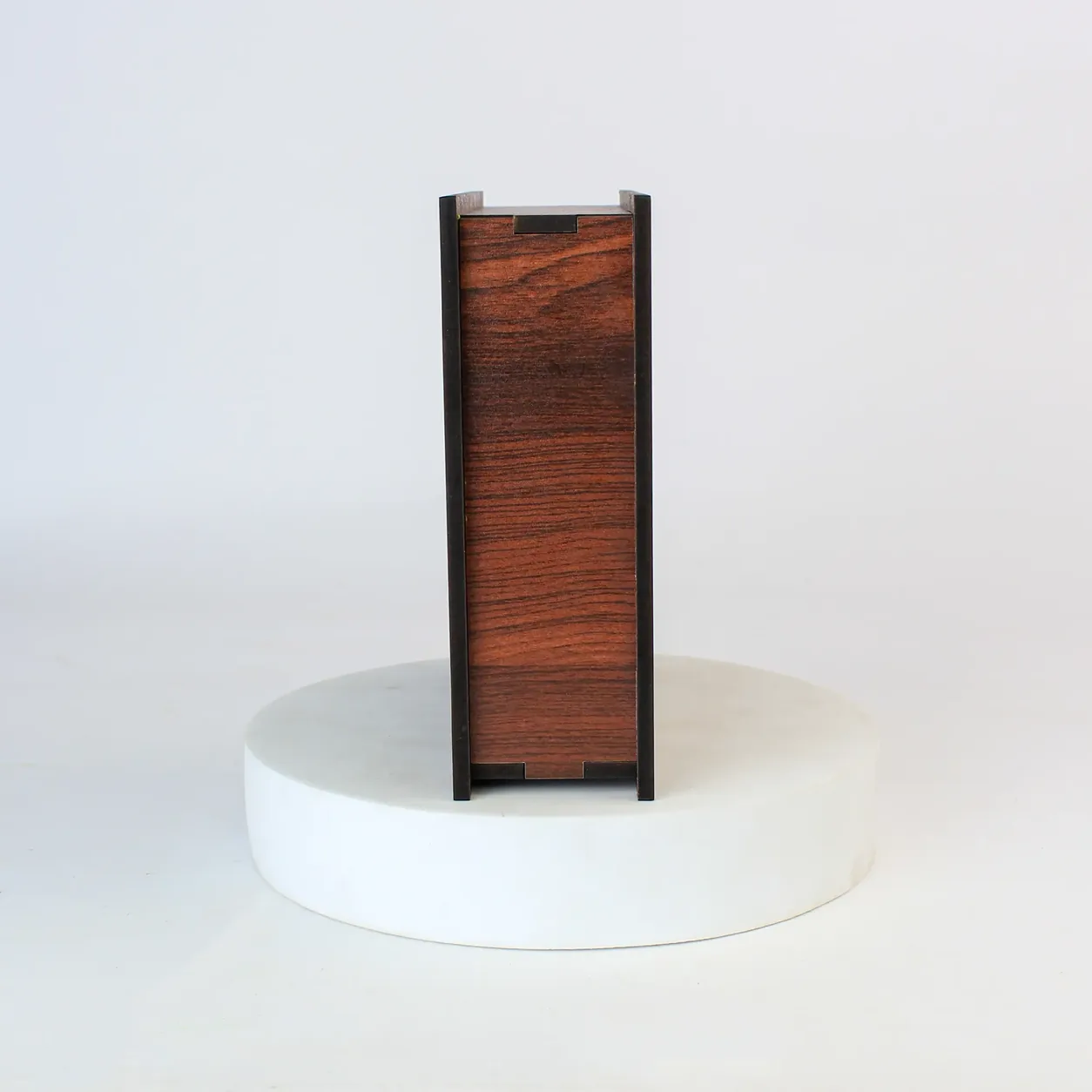 Fnamah66 side view, showing the slim wood-grain edge