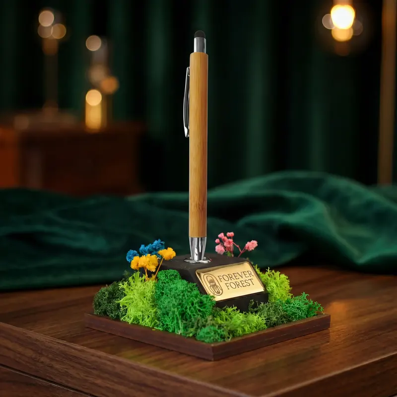 Forest Quill pen stand with preserved moss, a bamboo pen and an engraved nameplate