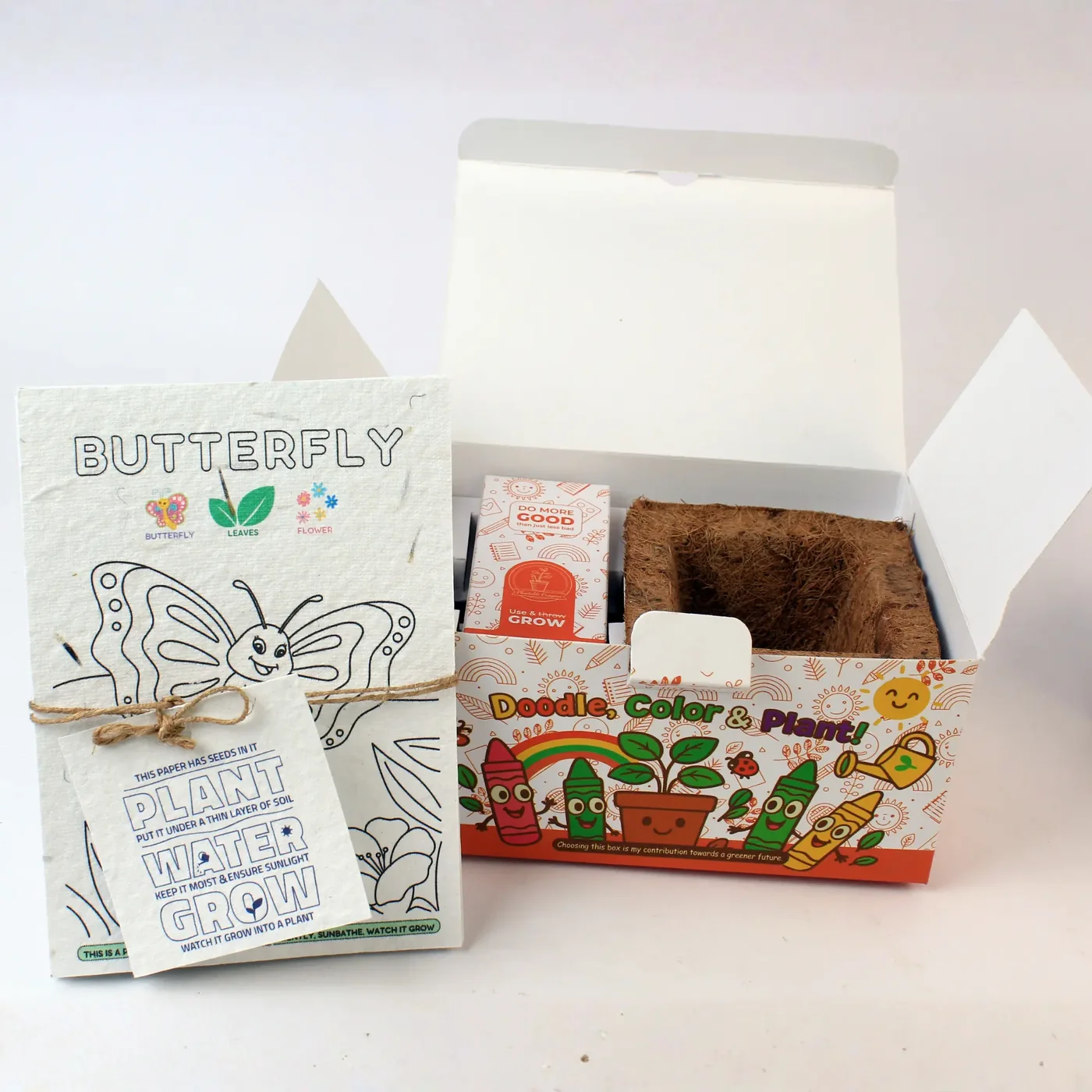 The DG30 box open, with the coco pot and crayon box packed inside and the sheets in front