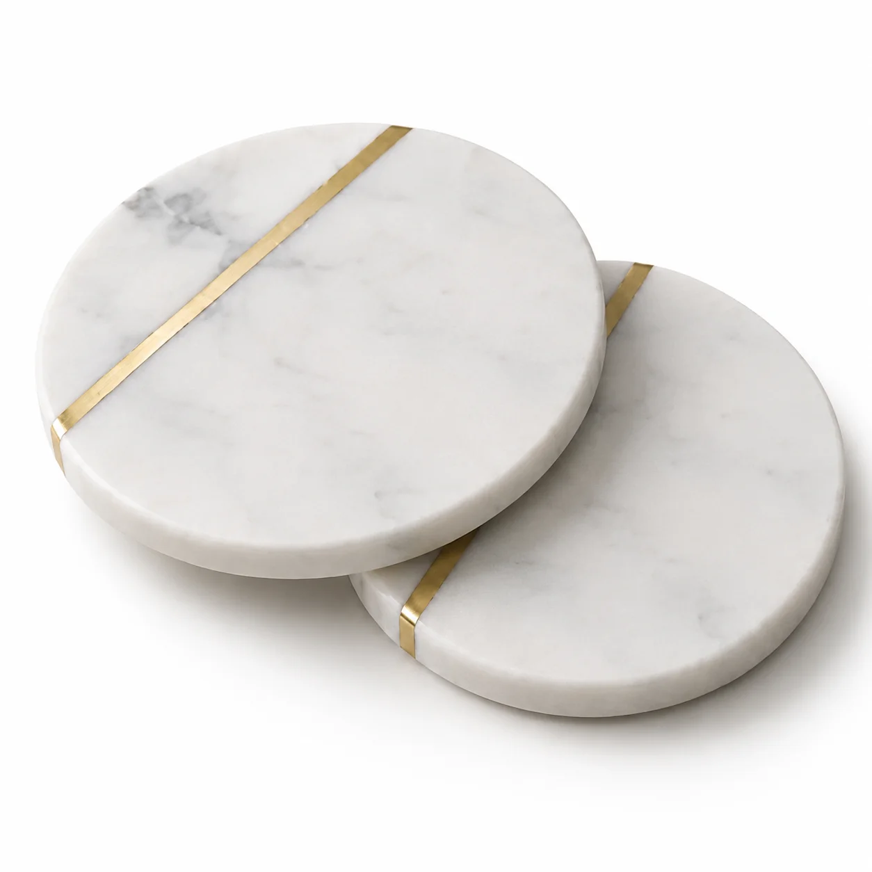 Two round marble coasters with diagonal brass inlay