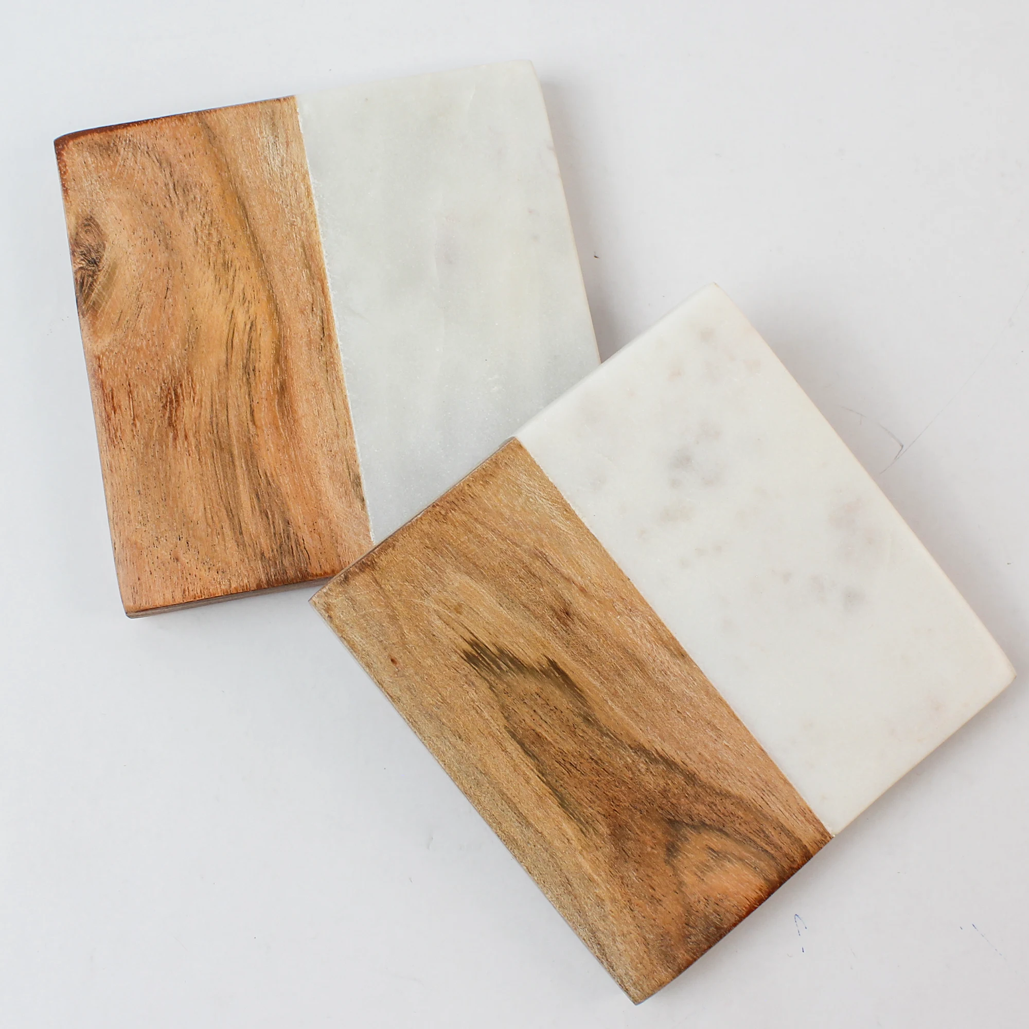 Two square marble and wood coasters