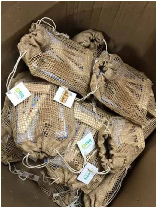 A pile of sealed jute bags ready to go