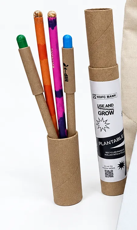 Plantable pens and pencils standing in kraft tubes