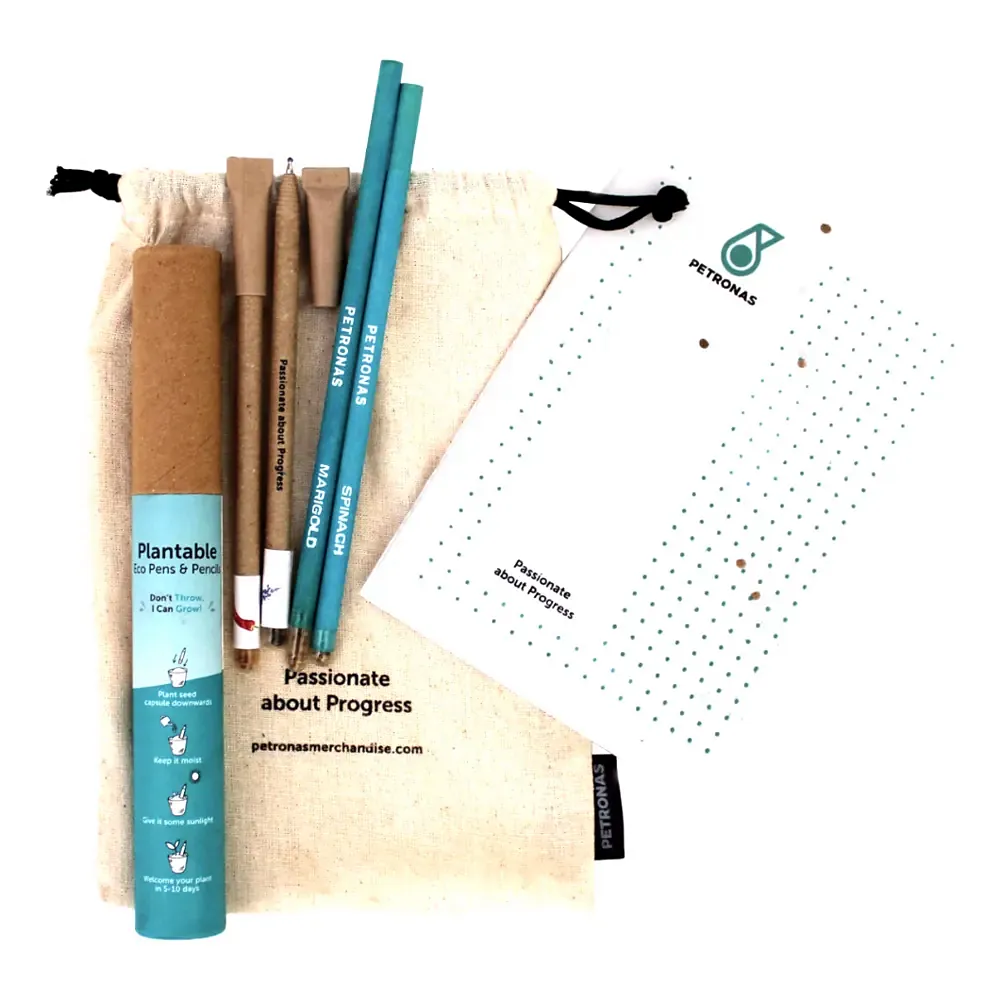 The kit laid out: bag, tube, notepad, pen and pencils