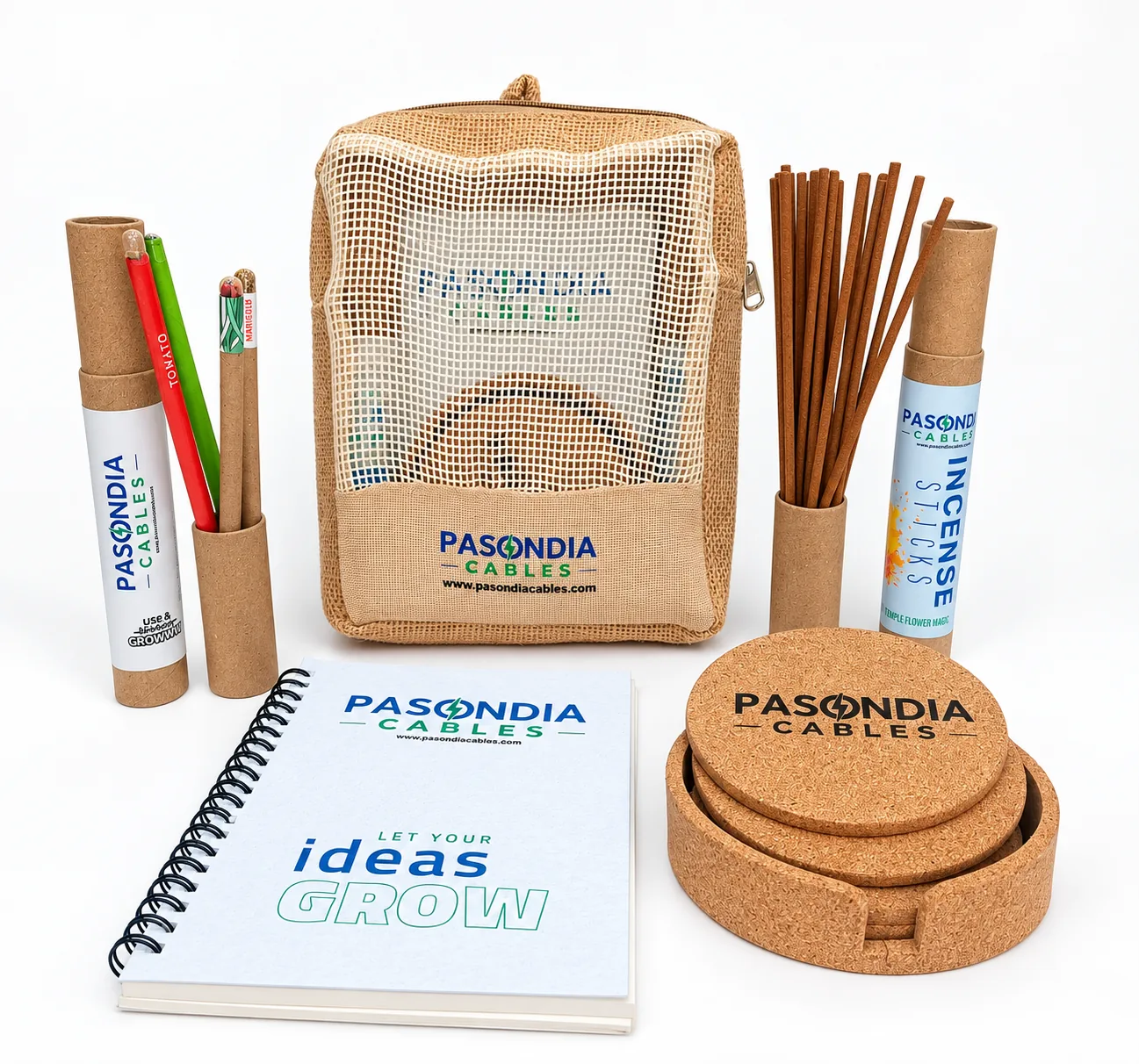 A jute-net backpack printed with the client’s name, a wire-bound seed-paper notebook, a cork coaster set, kraft tubes of pencils and incense, all carrying the mark