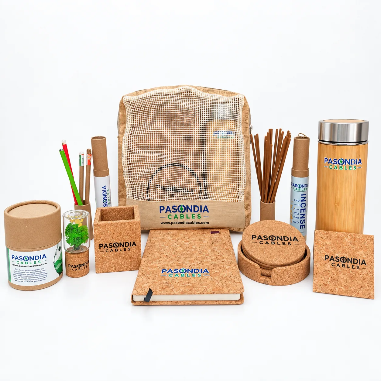 The full kit laid out with the backpack, flask, tubes, notebooks and coasters
