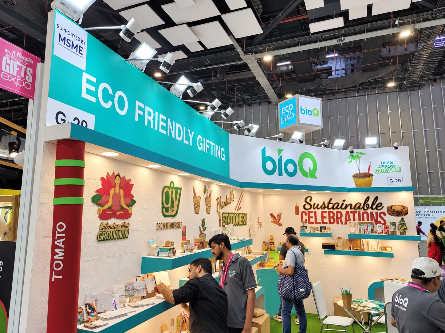 The bioQ stall with a Sustainable Celebrations sign and shelves of festive gifts