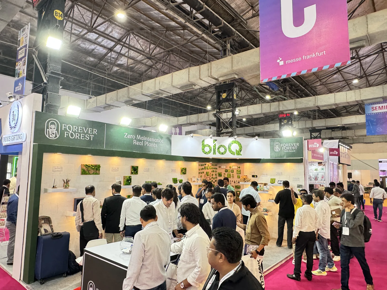 A busy aisle in front of the Forever Forest stall at Paperworld India, with visitors at the counter