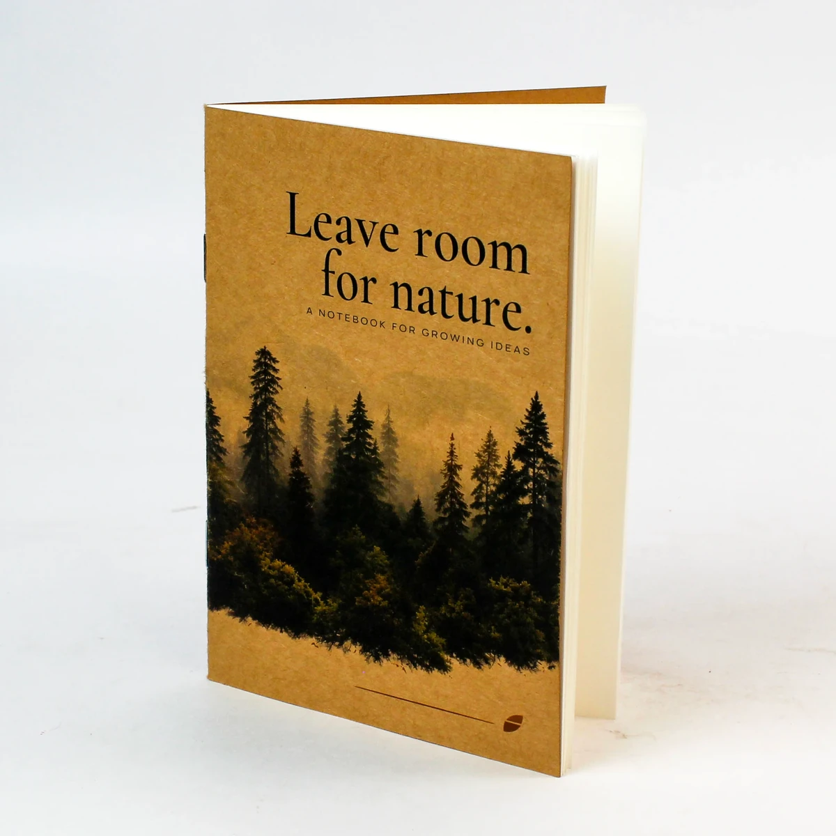 Kraft notebook front with forest artwork and a Leave room for nature cover message