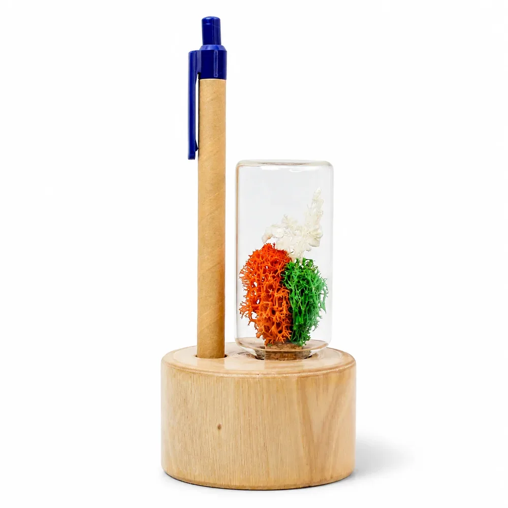 Wooden Forest Stump pen stand with recycled-paper pen and tricolour preserved botanicals under glass